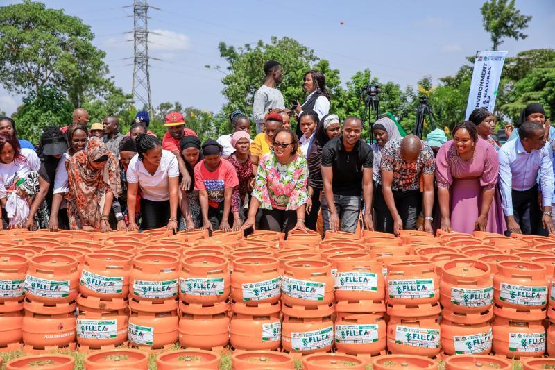 File image of Governor Ann Waiguru and the distributed gas cylinders